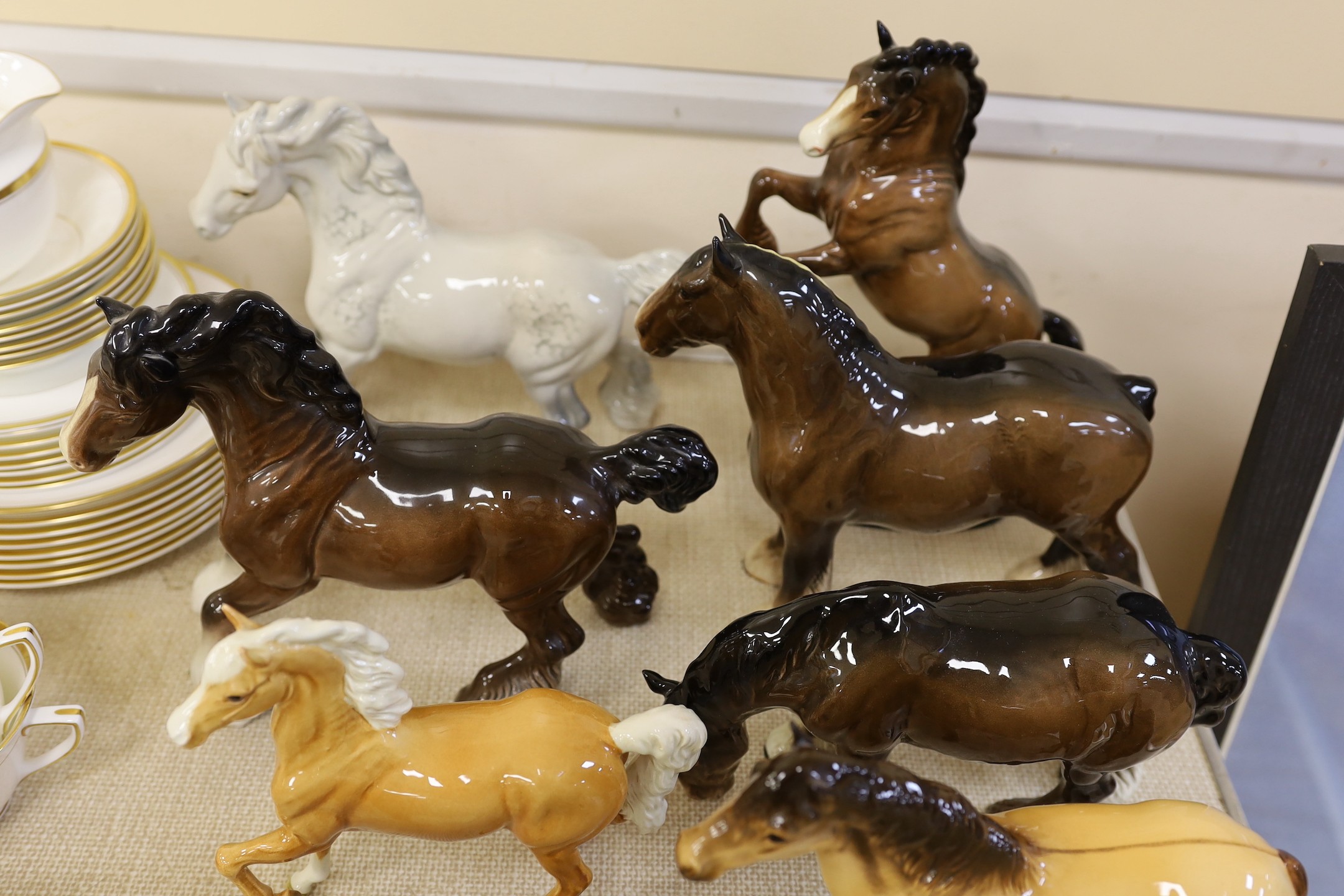 A selection of Beswick horses, to include Highland, Shire, Palomino and others (14)